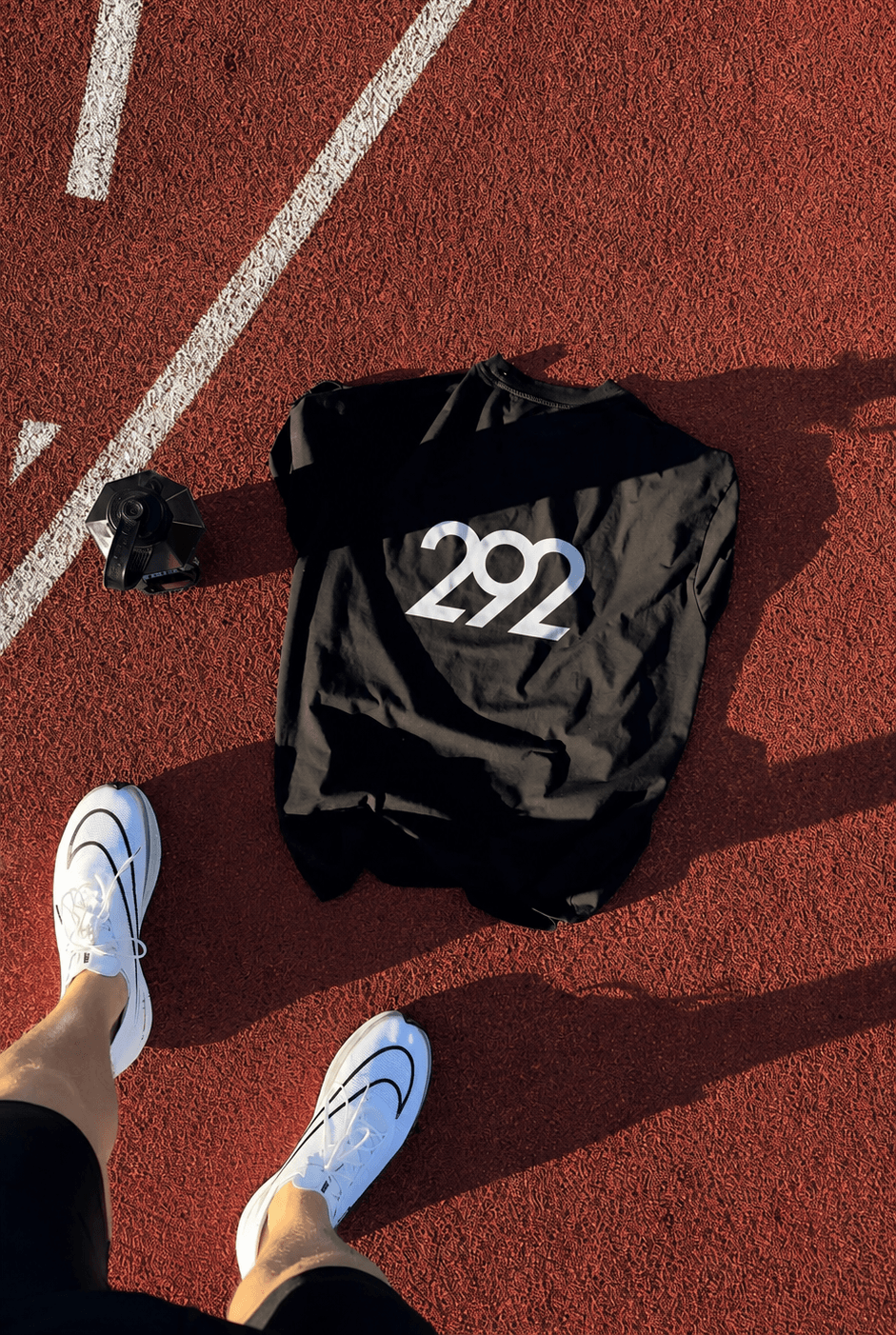 292 Performance training top laid out on the running track